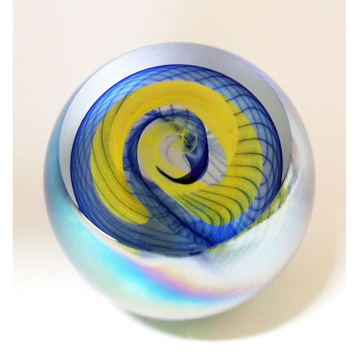 Glass Paperweight with Blue and Yellow Swirls