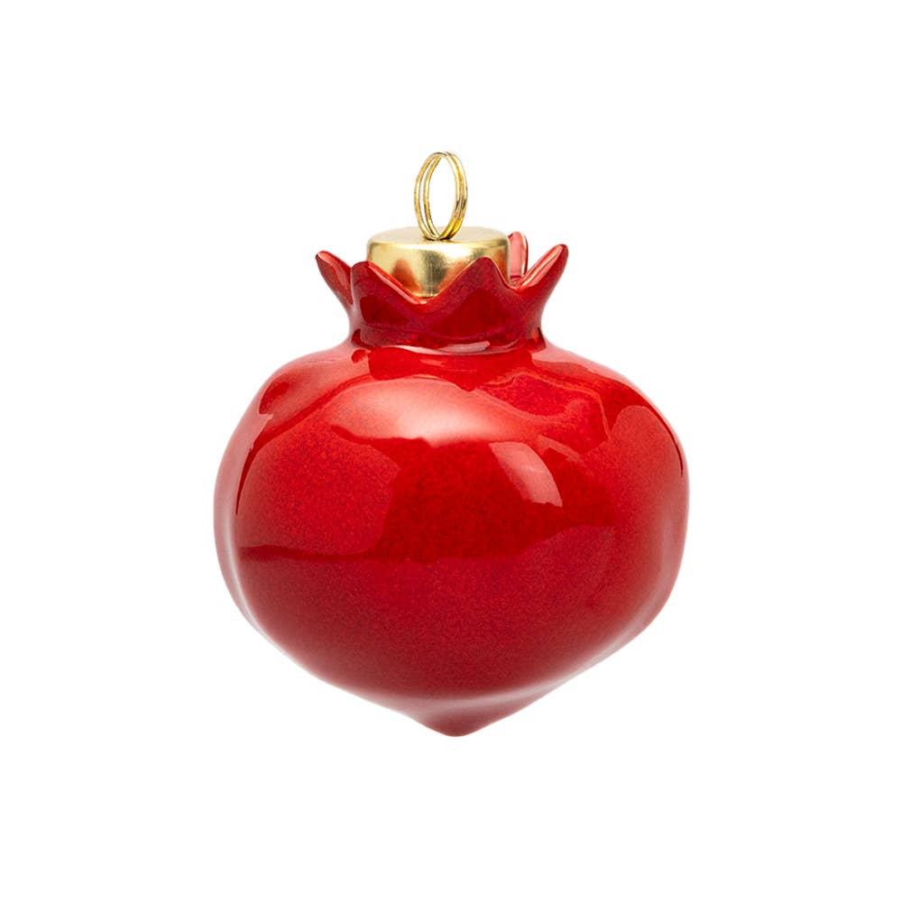 A glossy red pomegranate-shaped Christmas ornament with a gold hanging loop and gold crown detail, shown on a plain white background.