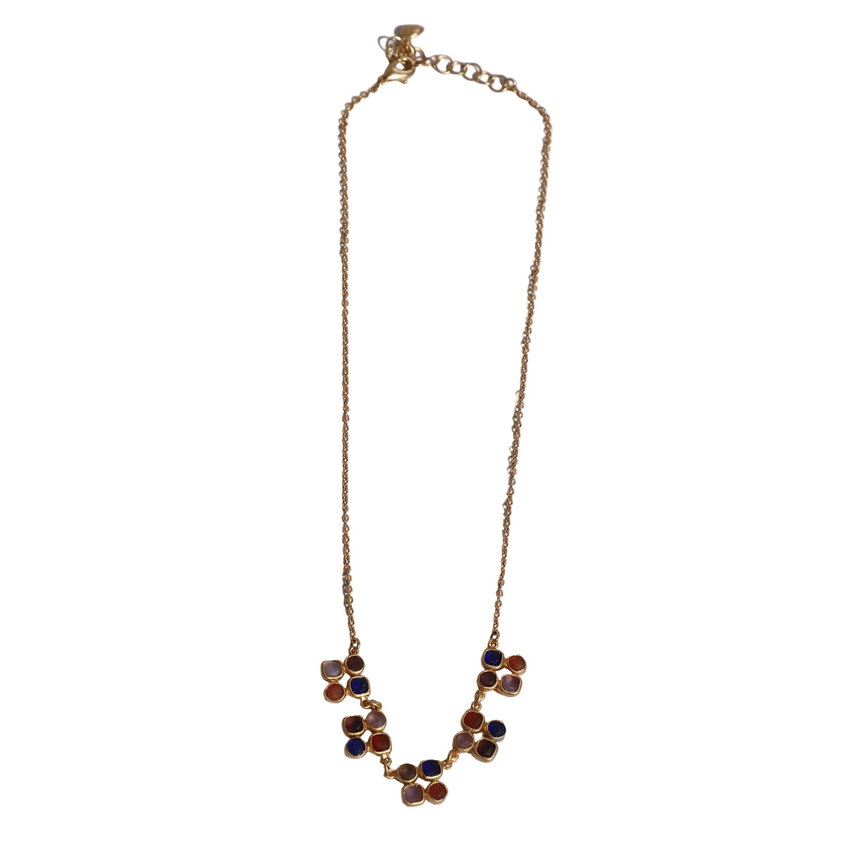 Necklace with floral design on a light gray background