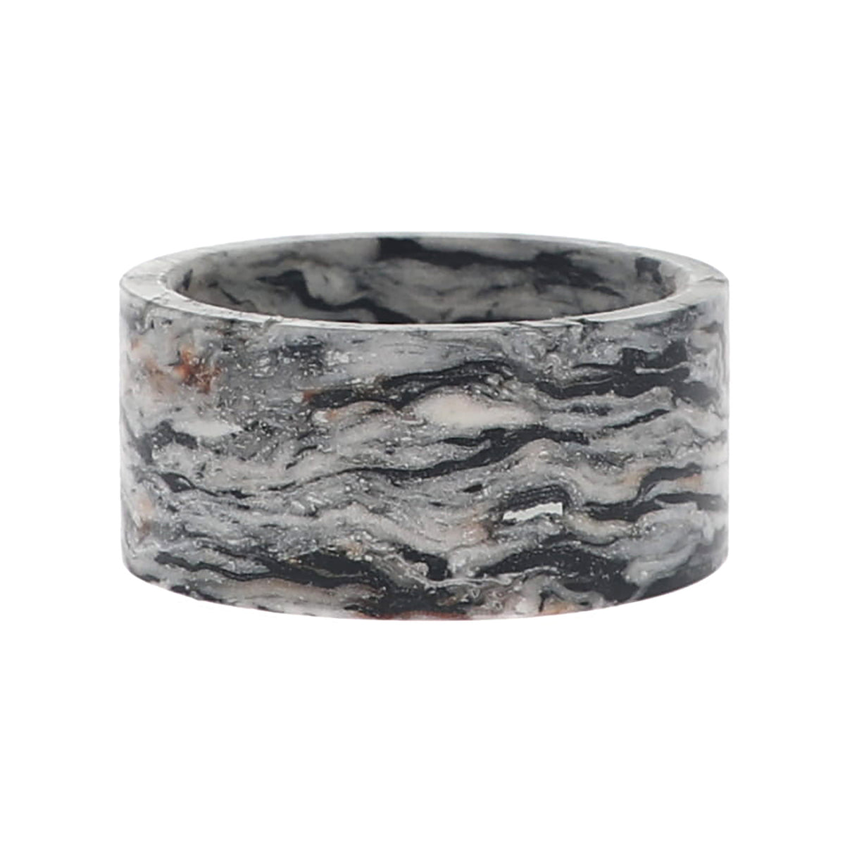 A napkin ring with swirling black, gray, white, and subtle warm brown veins, shown on a plain white background.