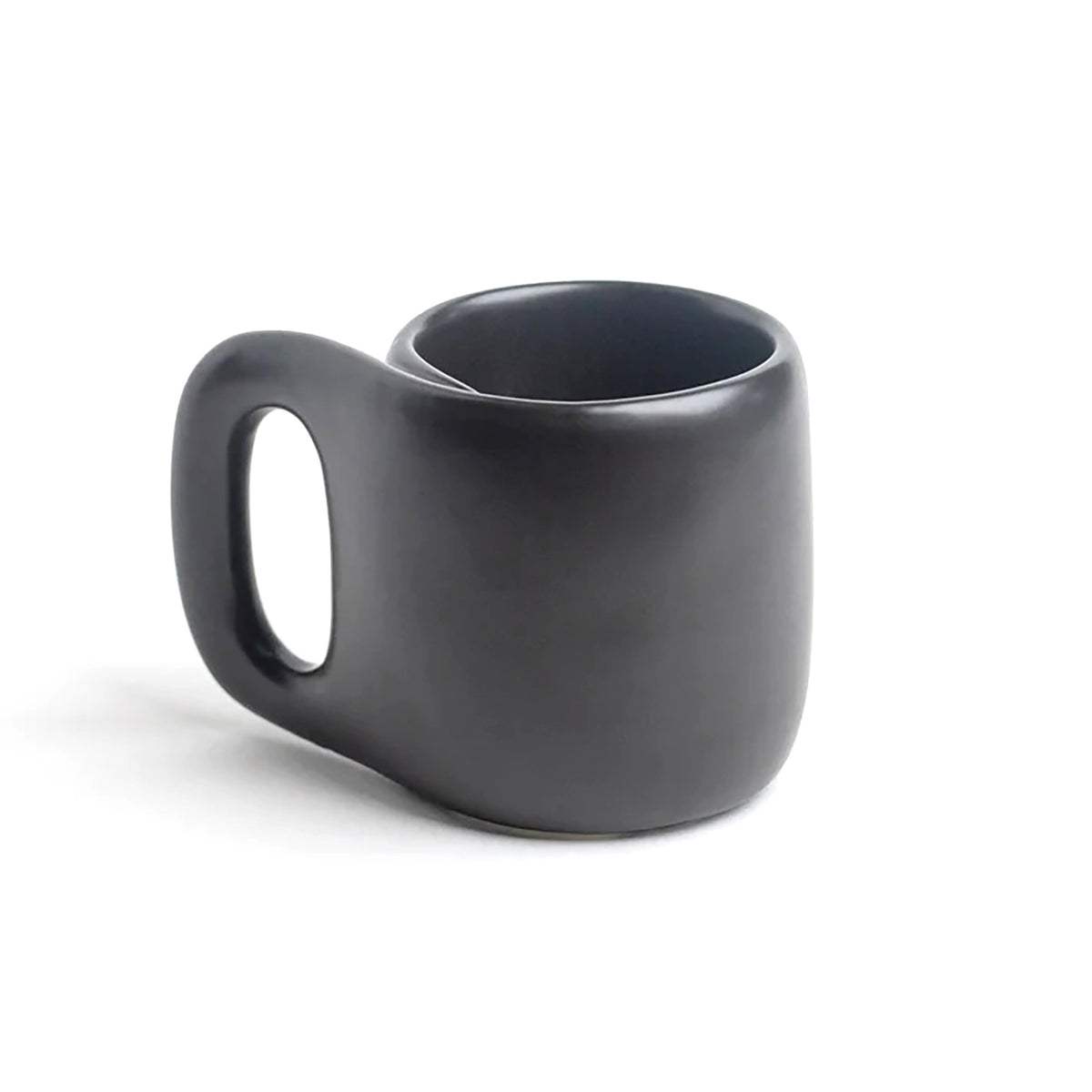 A matte black ceramic mug with a unique, integrated handle, shown on a clean white background.