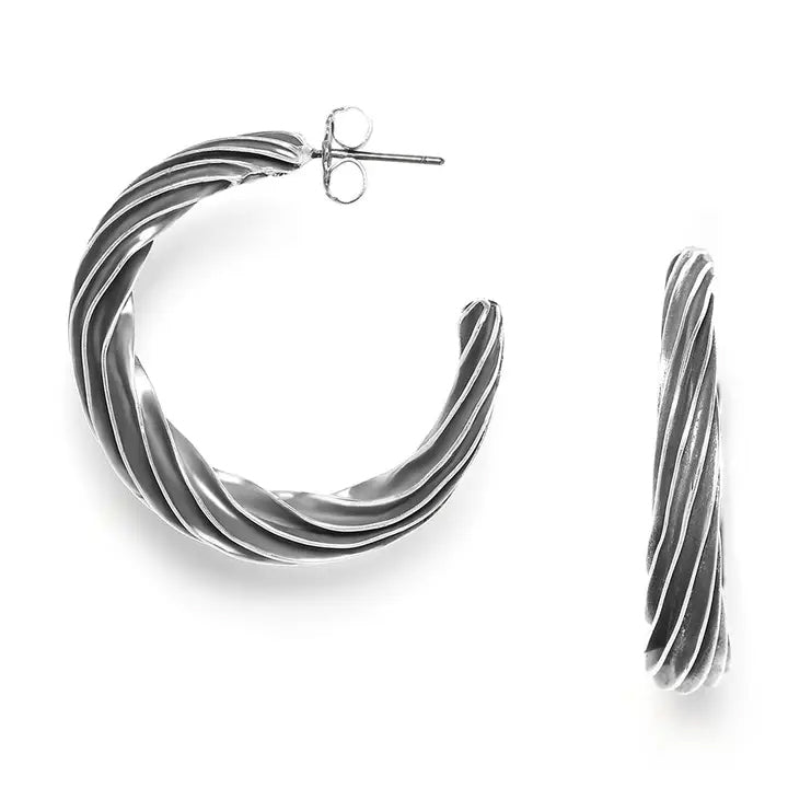 Silver hoop earrings on a white background