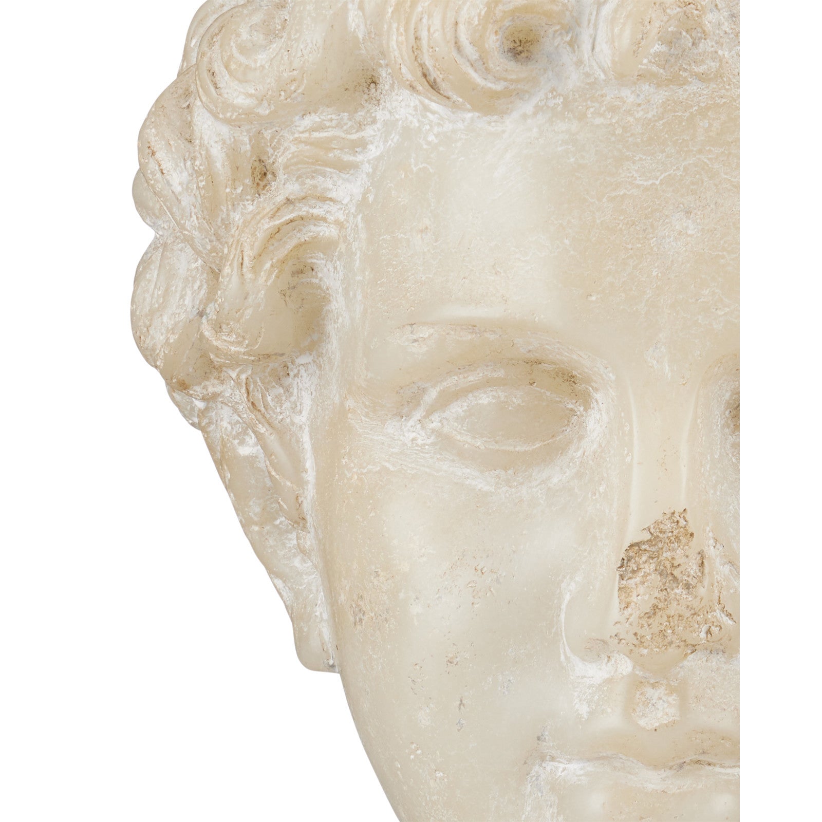 Marble sculpture of a head on a black stand against a white background