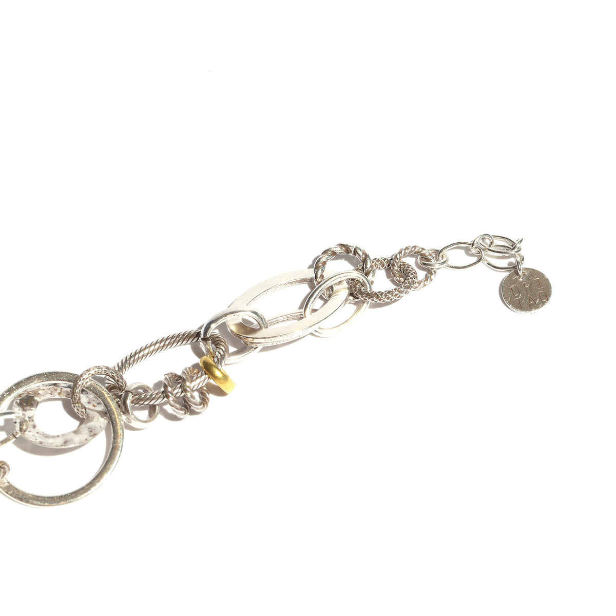 Silver charm bracelet on a white background