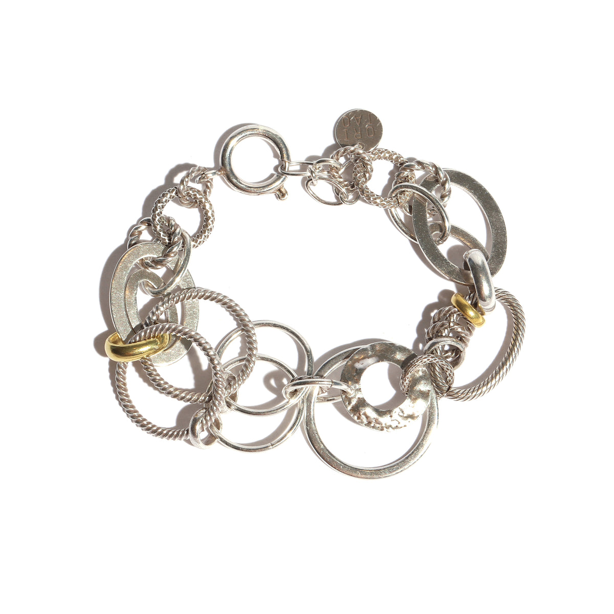 Silver and gold chain bracelet on a white background