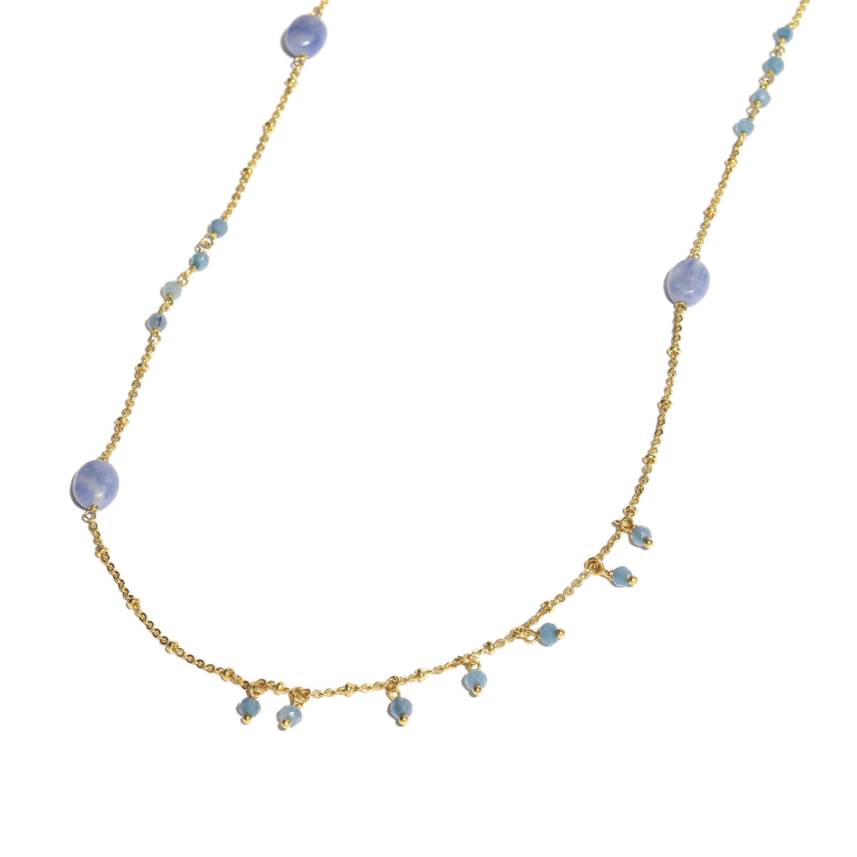 Necklace with gold chain and blue beads on a white background