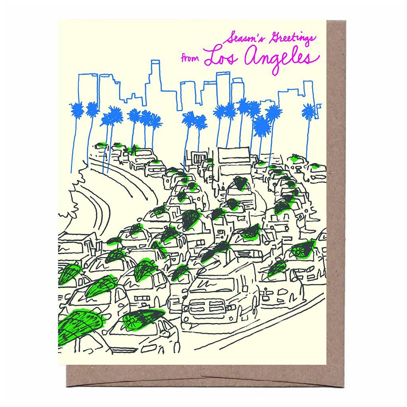 A greeting card featuring a hand-drawn sketch of a Los Angeles street scene with palm trees, cars, and a skyline, with the text 'Season's Greetings from Los Angeles' in pink at the top. The card is shown with a brown kraft envelope behind it on a white background.