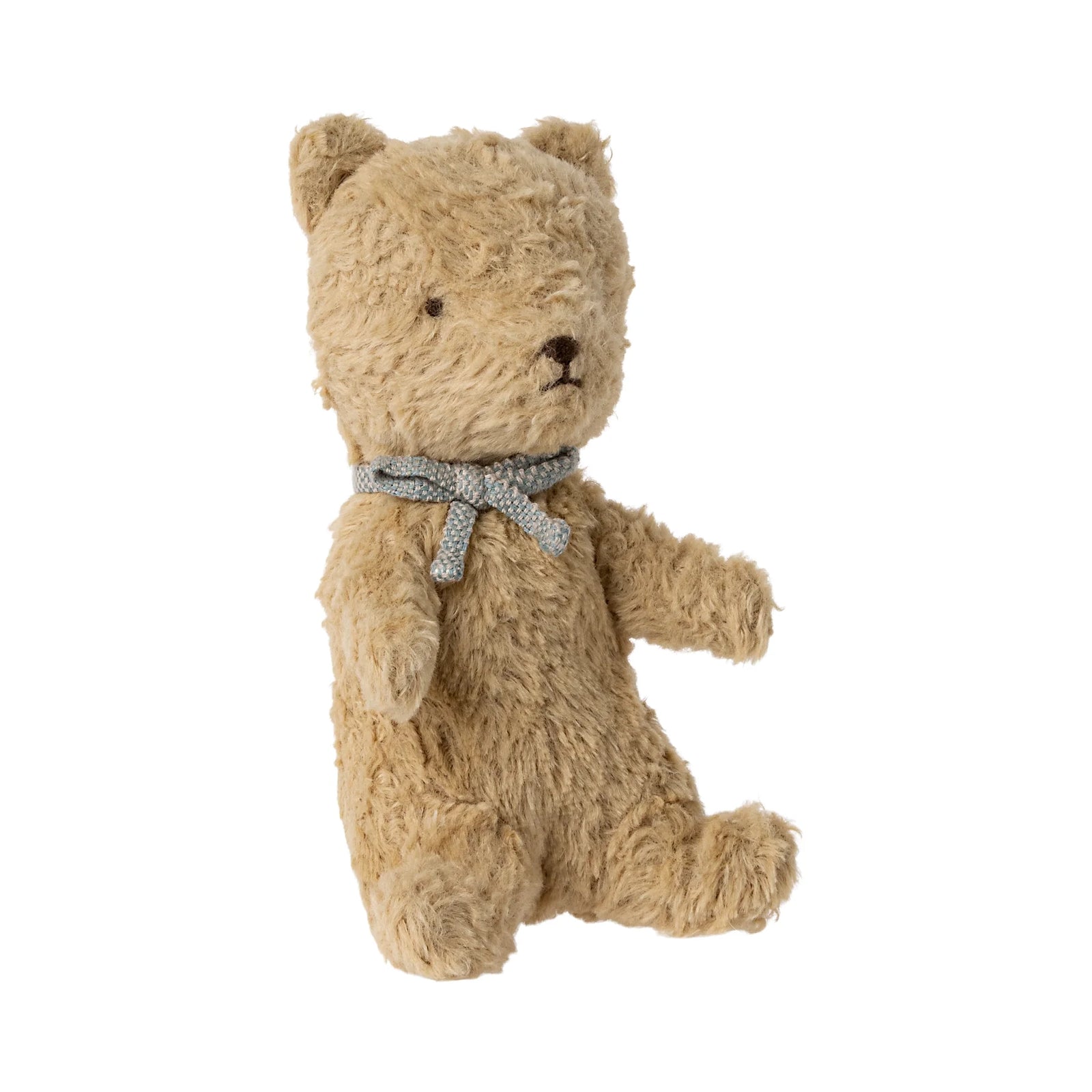 Plush teddy bear with a gray bow tie on a white background