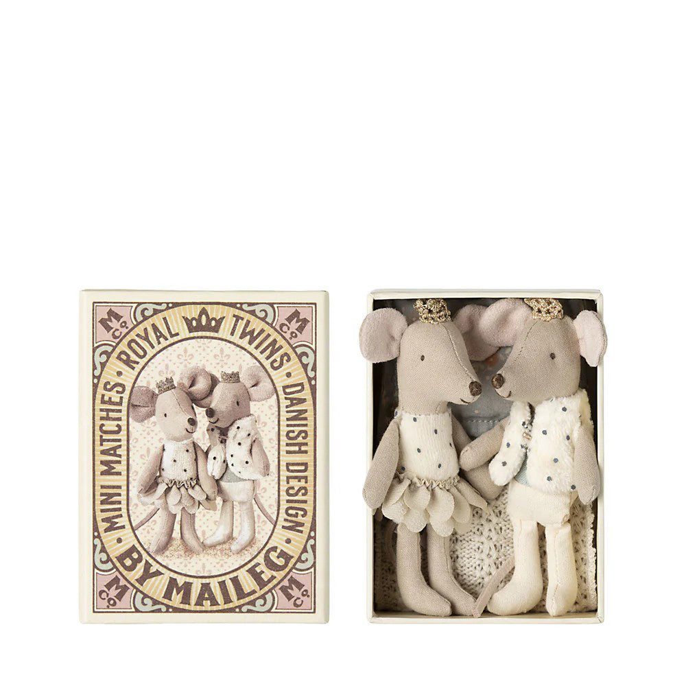 Two stuffed mouse toys in a box with a decorative matchbox-style label on a white background.
