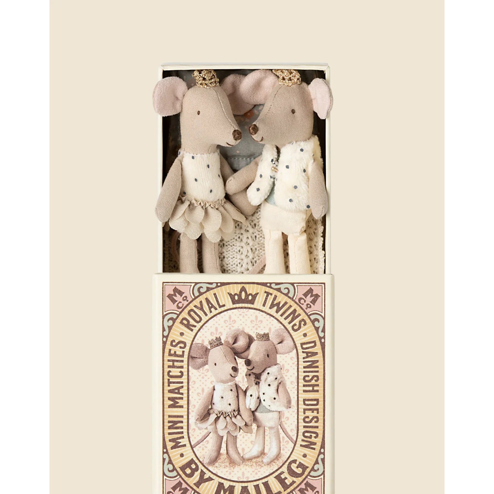 Two plush mouse toys with decorative outfits on a white background