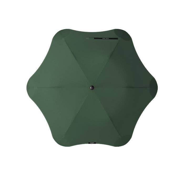 A dark green hexagonal umbrella shown from a top-down view on a solid white background.