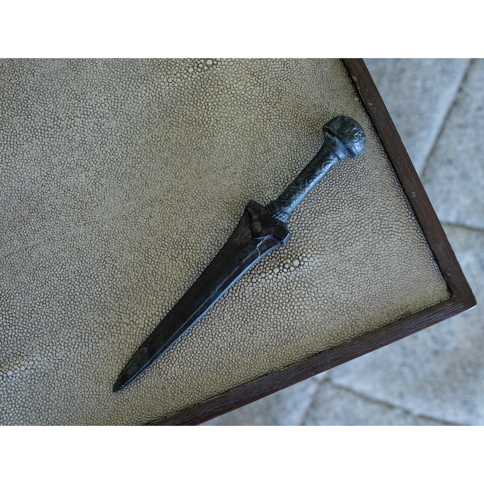 Decorative dagger with a detailed hilt on a white background