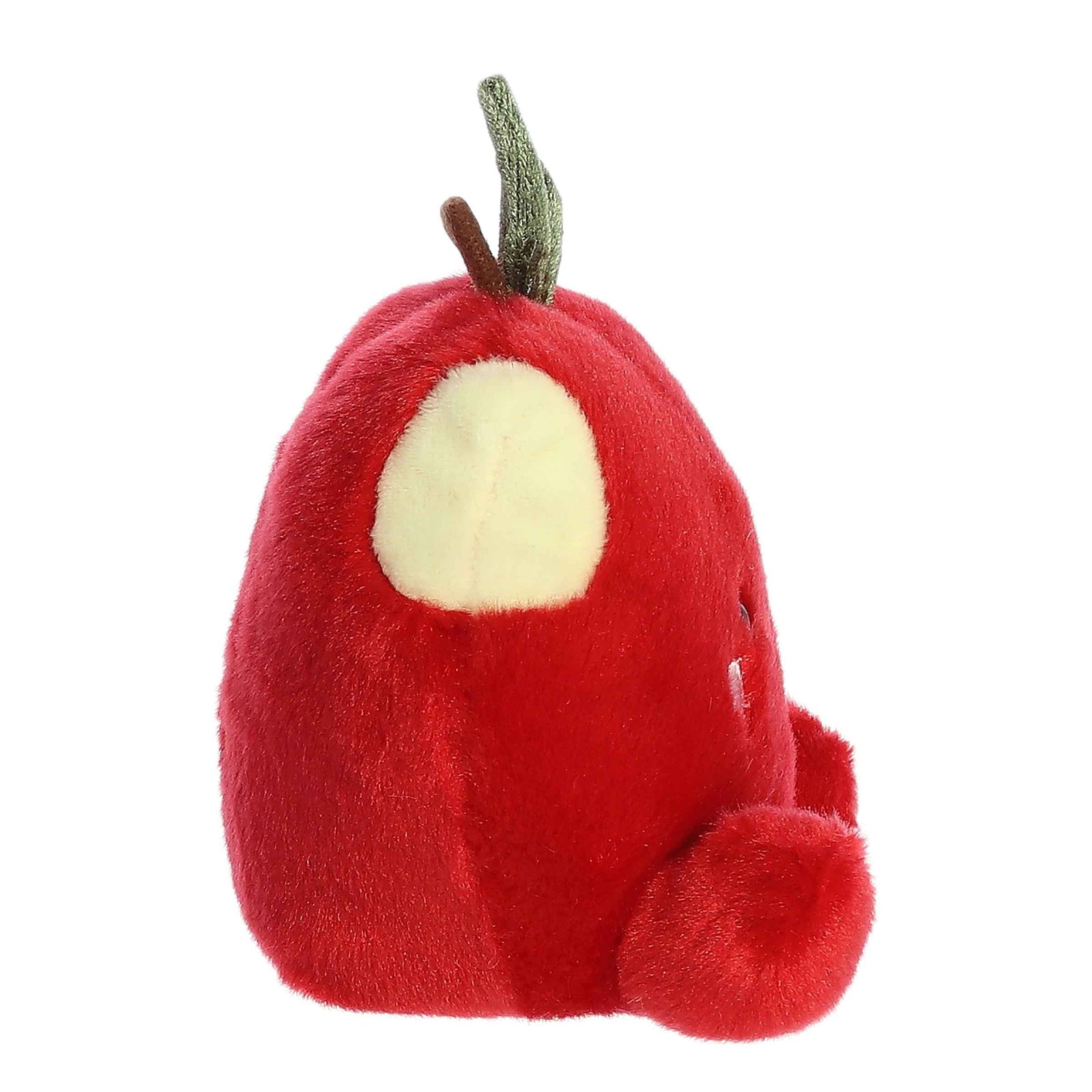 Plush toy shaped like a red apple with a smiling face on a white background