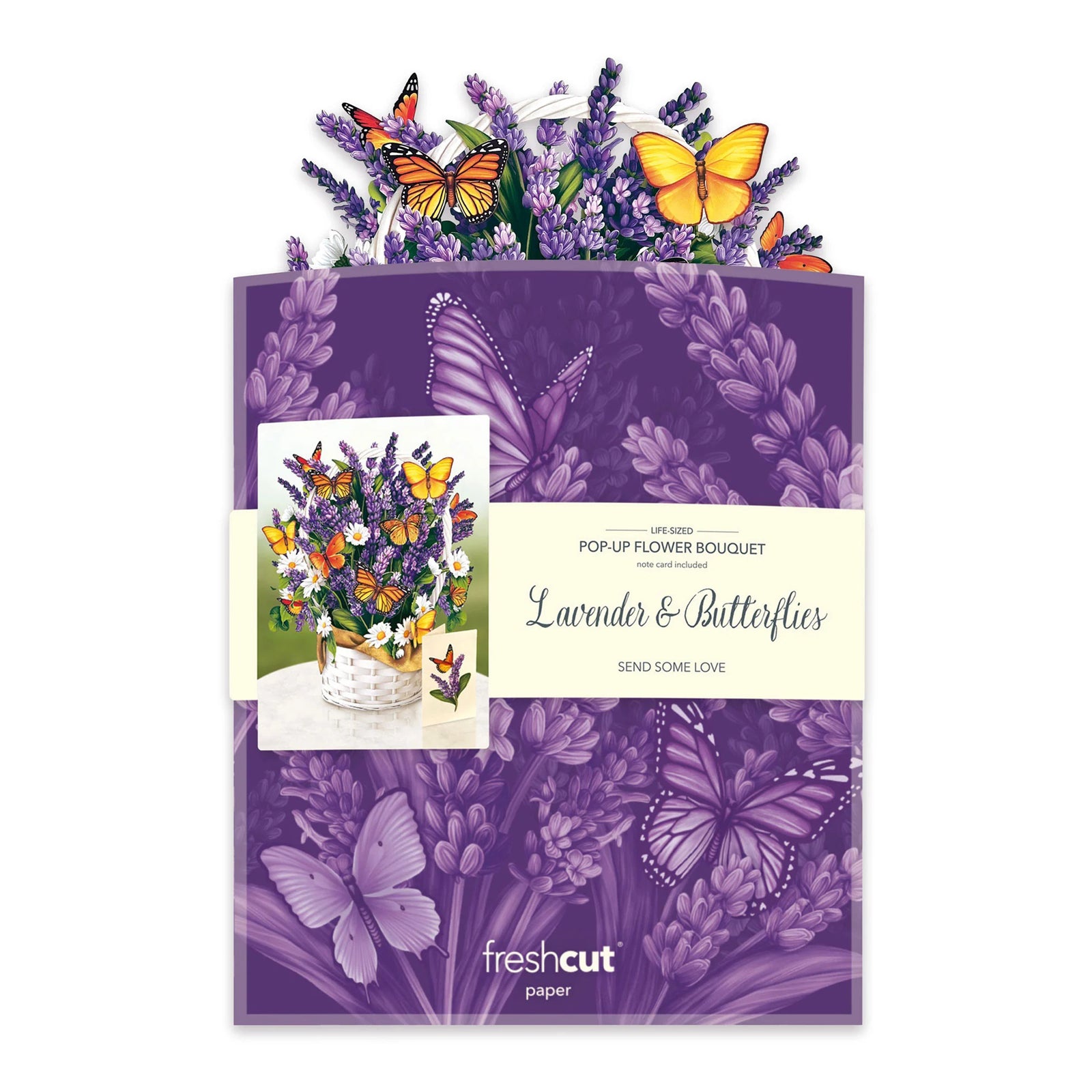 A notecard with a pop-up design featuring lavender flowers and butterflies, presented in a white basket.