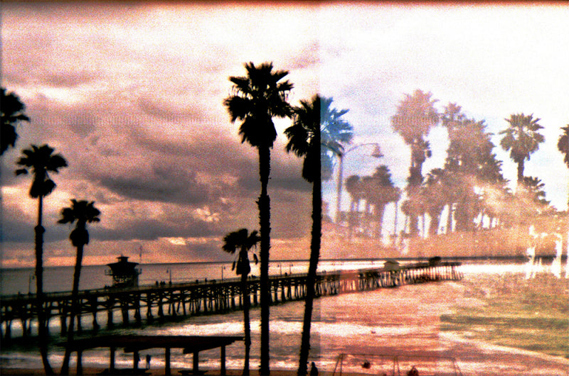 Colorful toy camera with 'HOLGA 135FC' branding on a white background