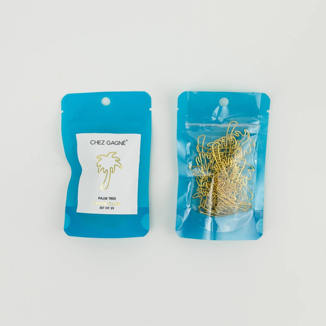 Two blue resealable pouches on a white background: one labeled 'CHEZ GAGNÉ PALM TREE WIRE CLIPS SET OF 20' and one clear pouch containing gold palm tree wire clips.