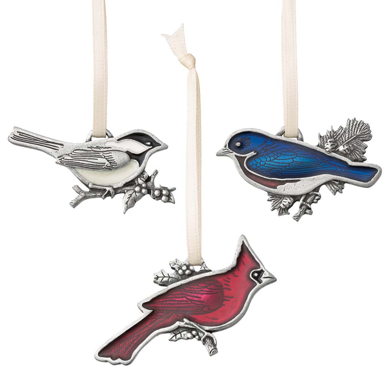 Three bird-shaped ornaments on white background