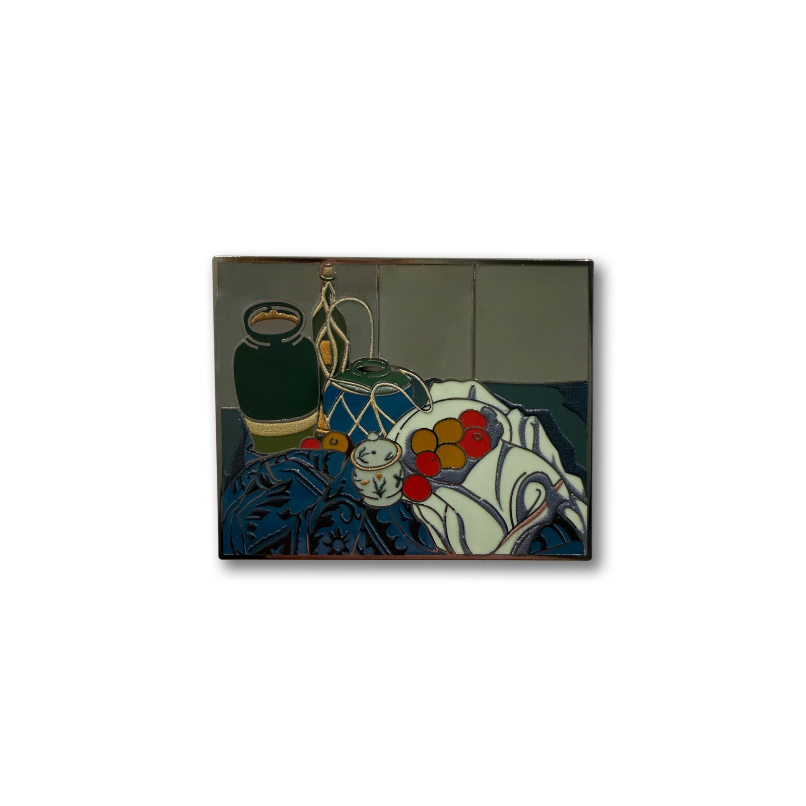 Decorative enamel pin with a still life design featuring a teapot, fruit, and other objects on a white background.