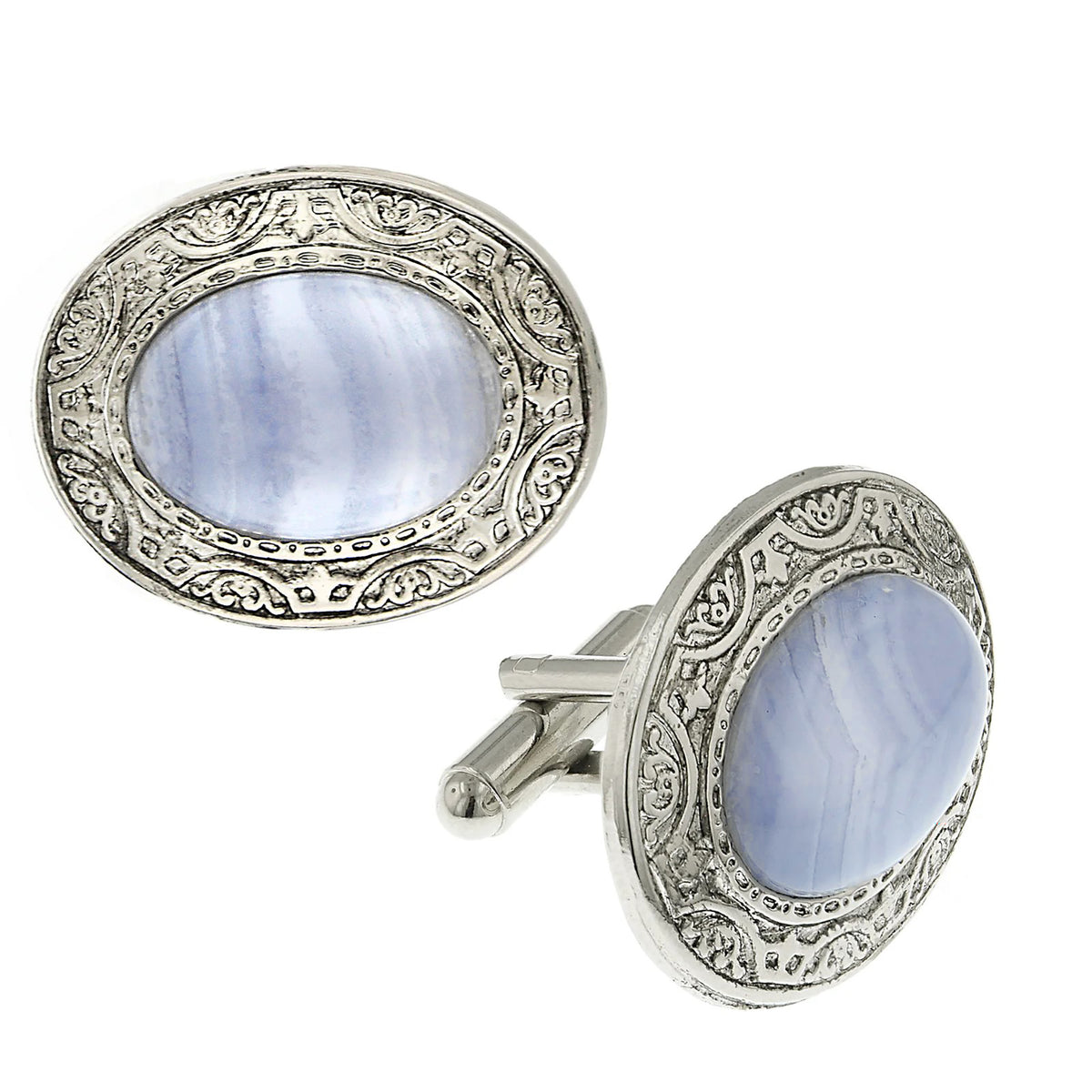 Silver cufflinks with blue stone centers on a white background