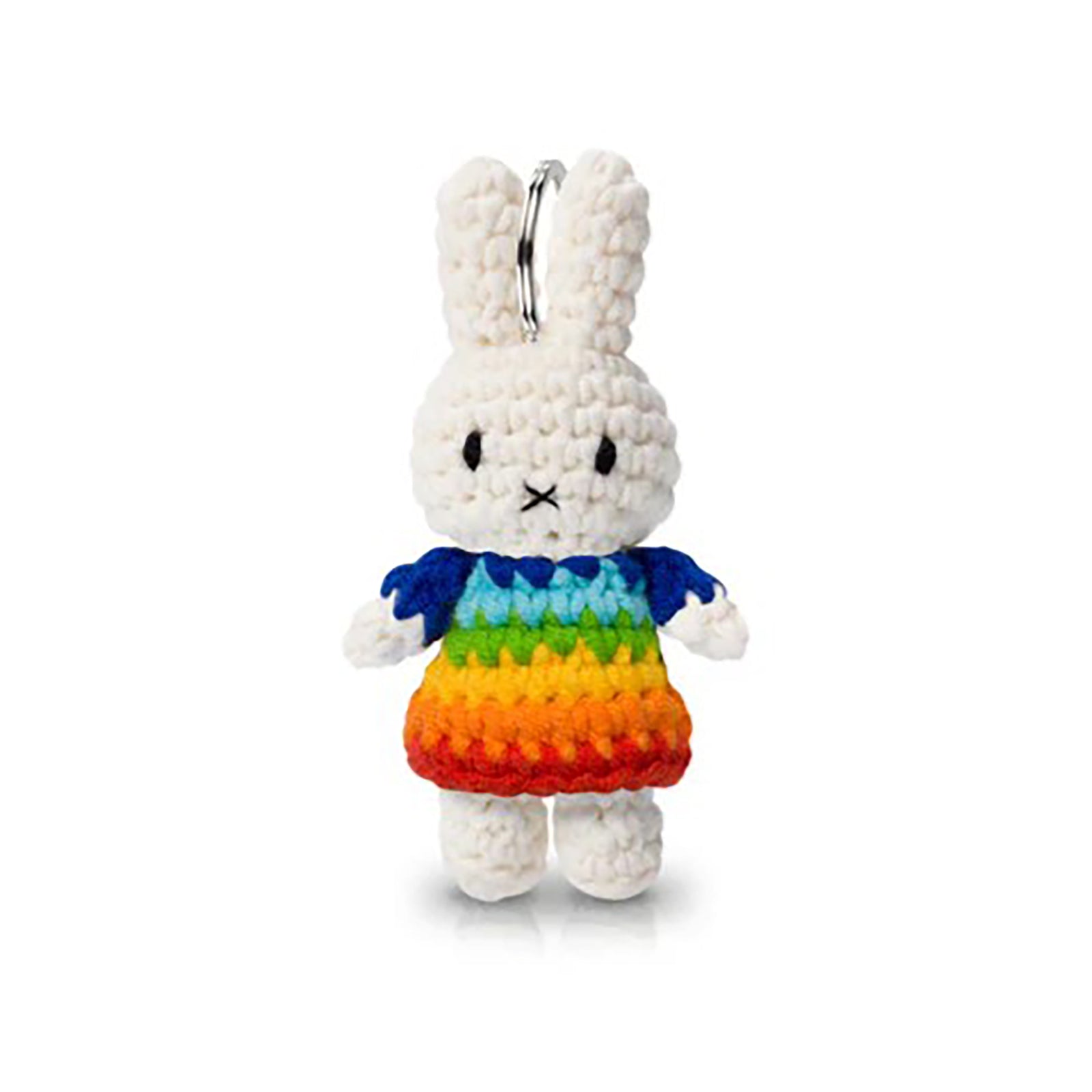White bunny plush toy with a colorful dress on a white background