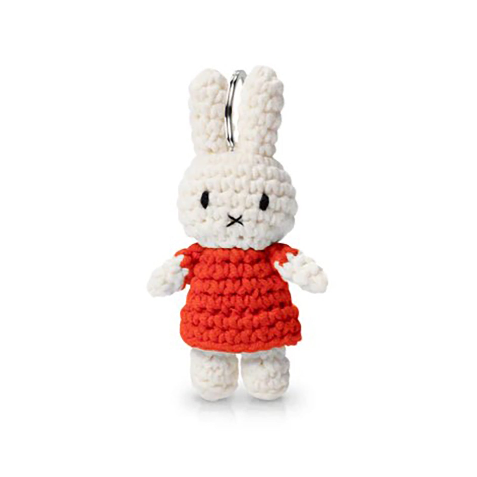 White bunny plush toy with a red dress on a white background