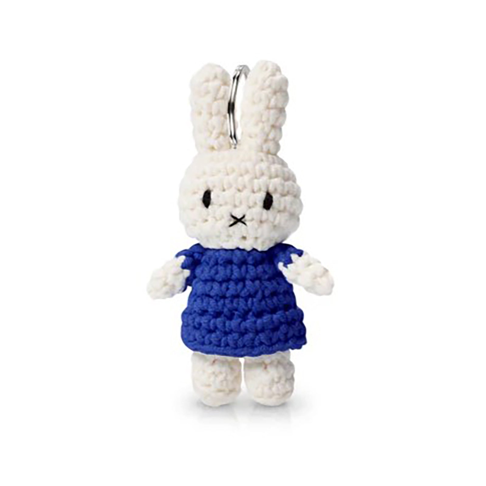 White bunny plush toy with a blue dress on a white background
