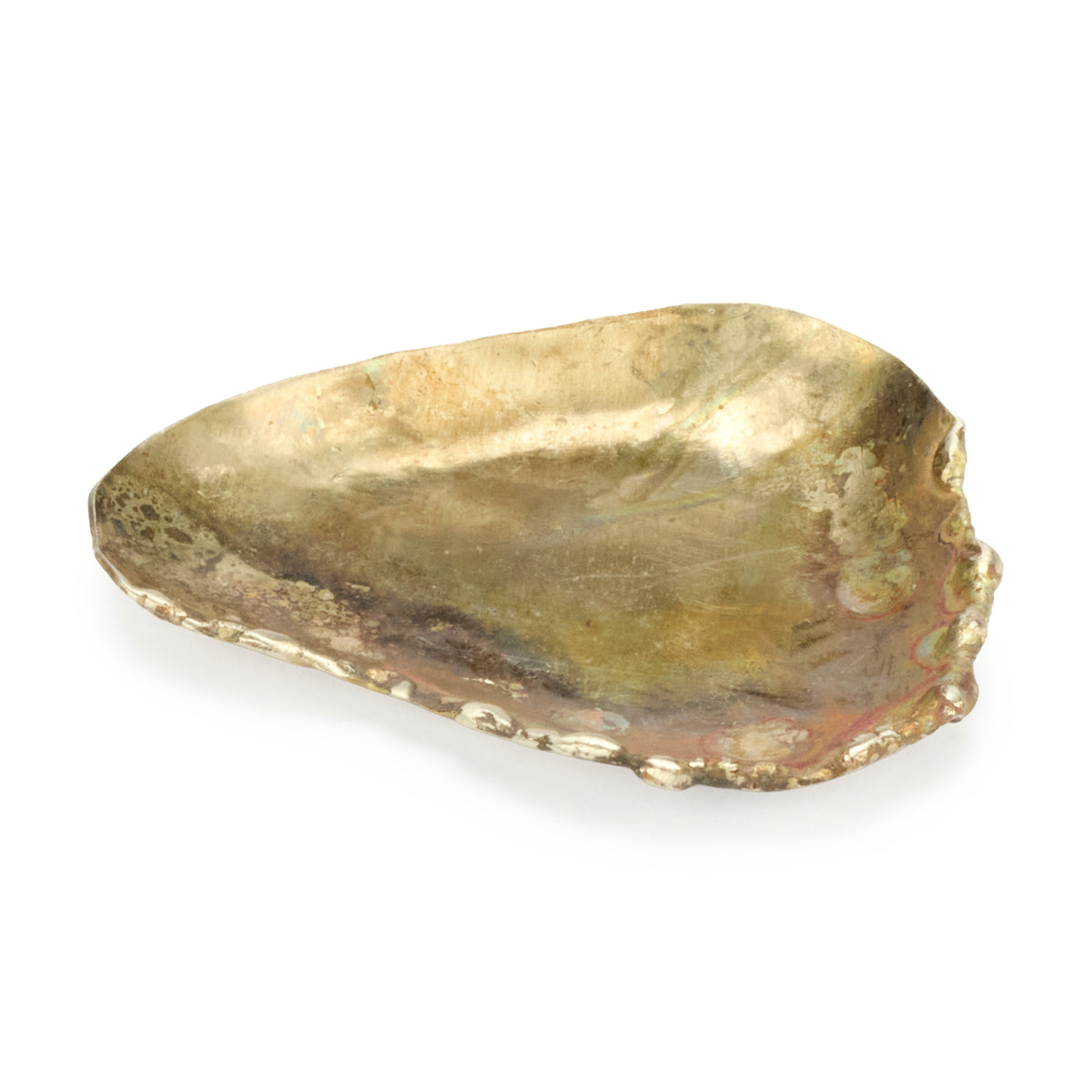 Gold-colored metal dish on a white background