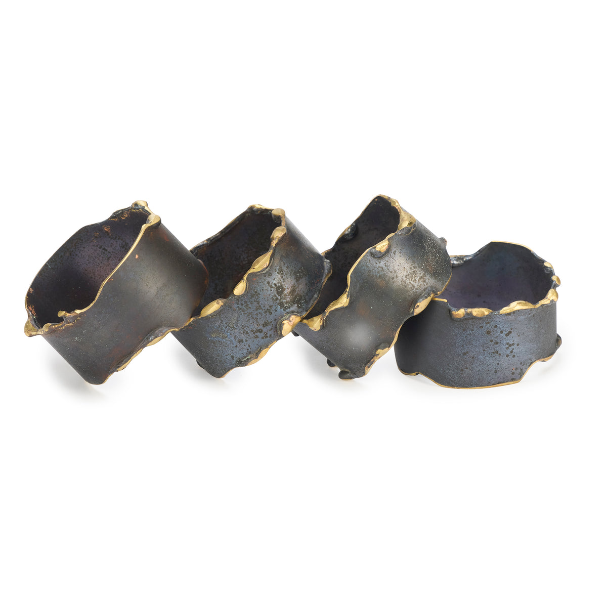 Black and gold napkin rings on a white background