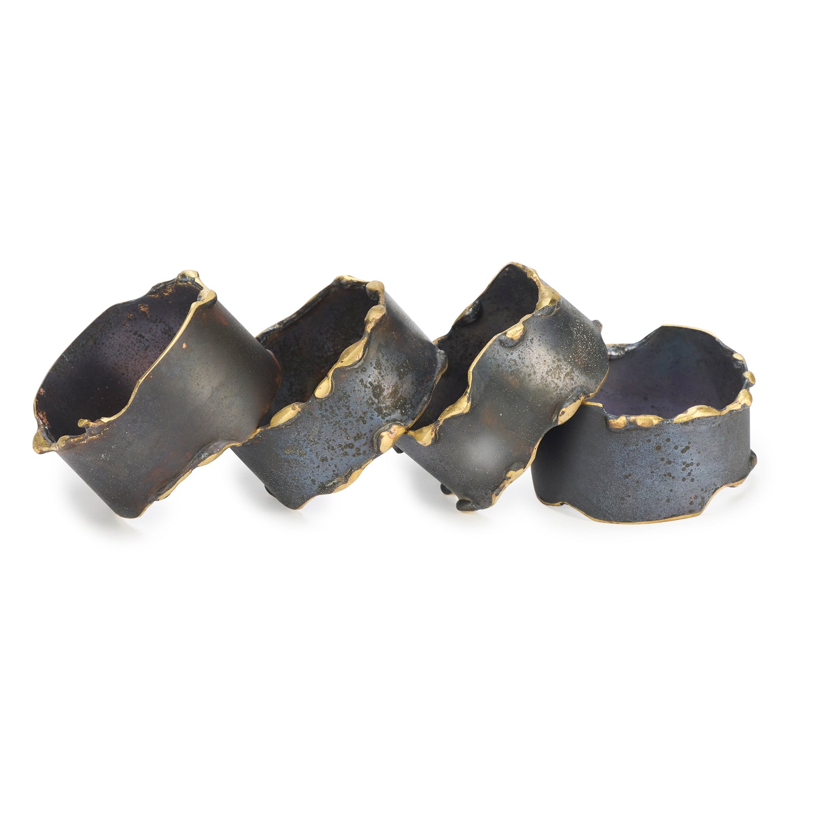 Black and gold napkin rings on a white background