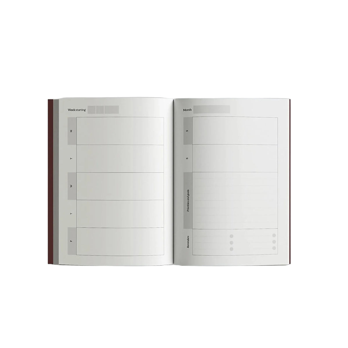 Open notebook with grid layout on a white background