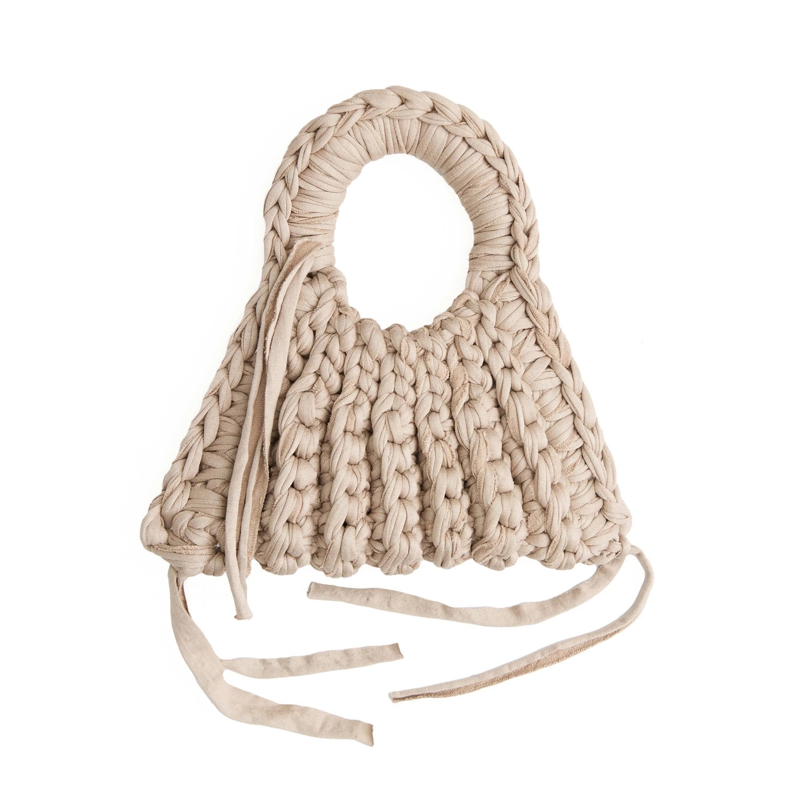 Beige woven handbag with fringe on a white background