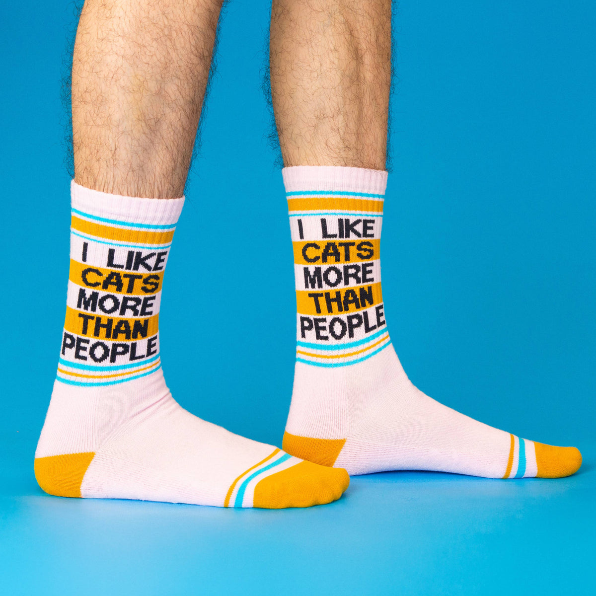 White socks with text and colorful accents on a blue background