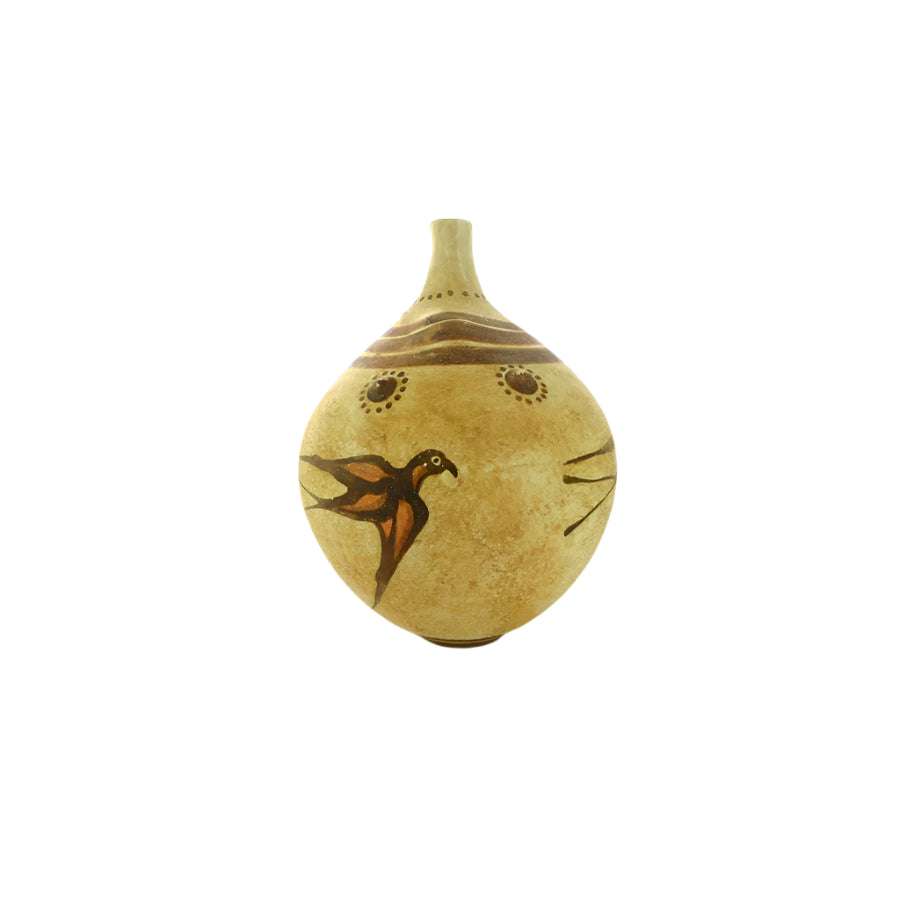An ancient Greek vessel replica decorated with swallow motifs on a beige background.