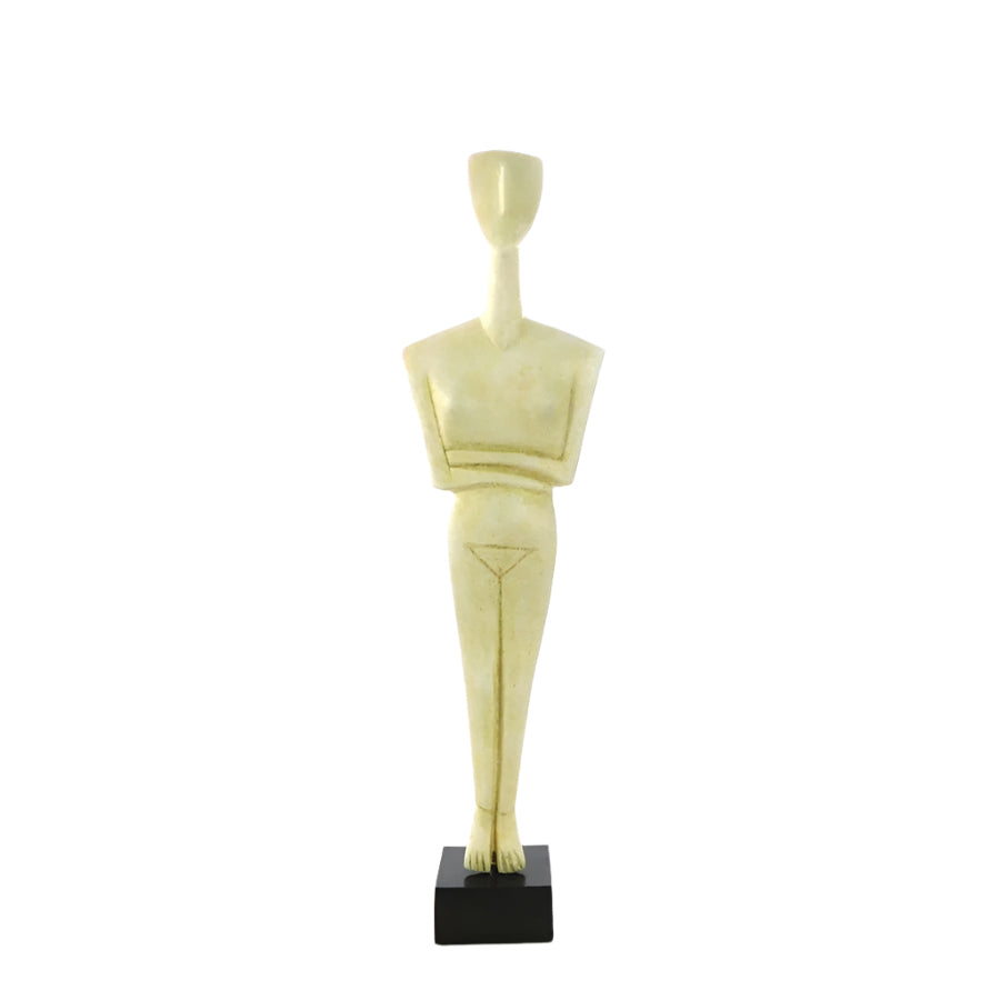 Abstract cycladic sculpture on a white background