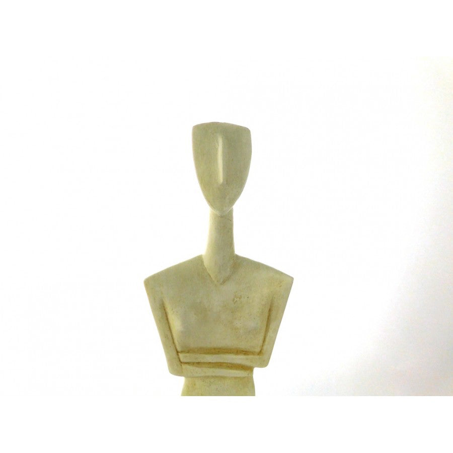 Abstract cycladic sculpture on a white background