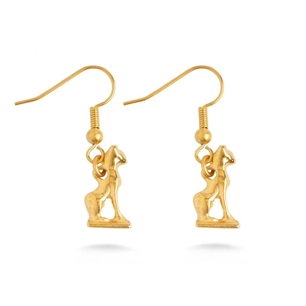 Gold earring with a figure design on a white background