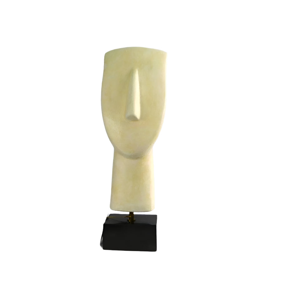 A Cycladic head sculpture replica, predominantly in a beige tone with a minimalist design, mounted on a black base.
