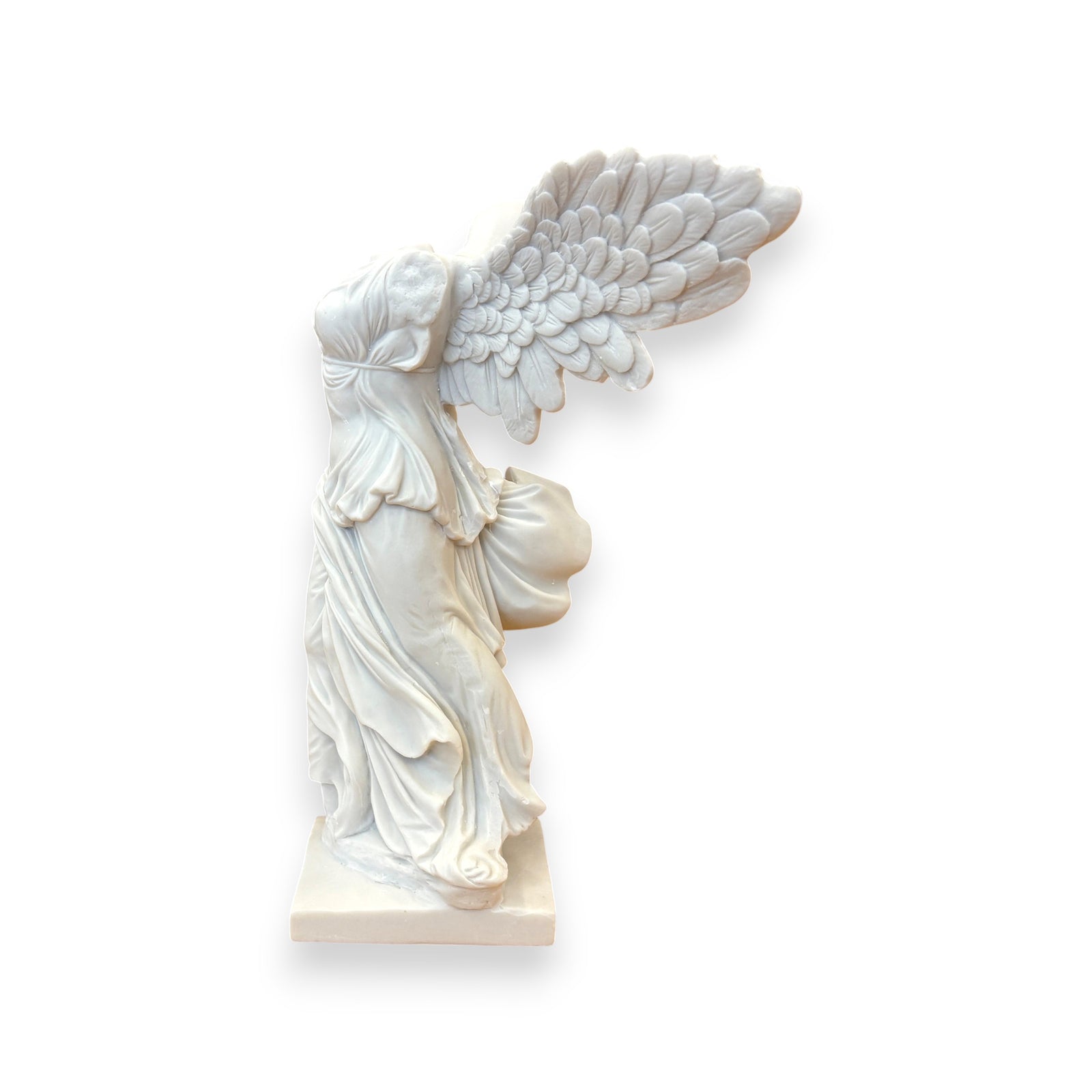 Statue of a winged figure on a white background