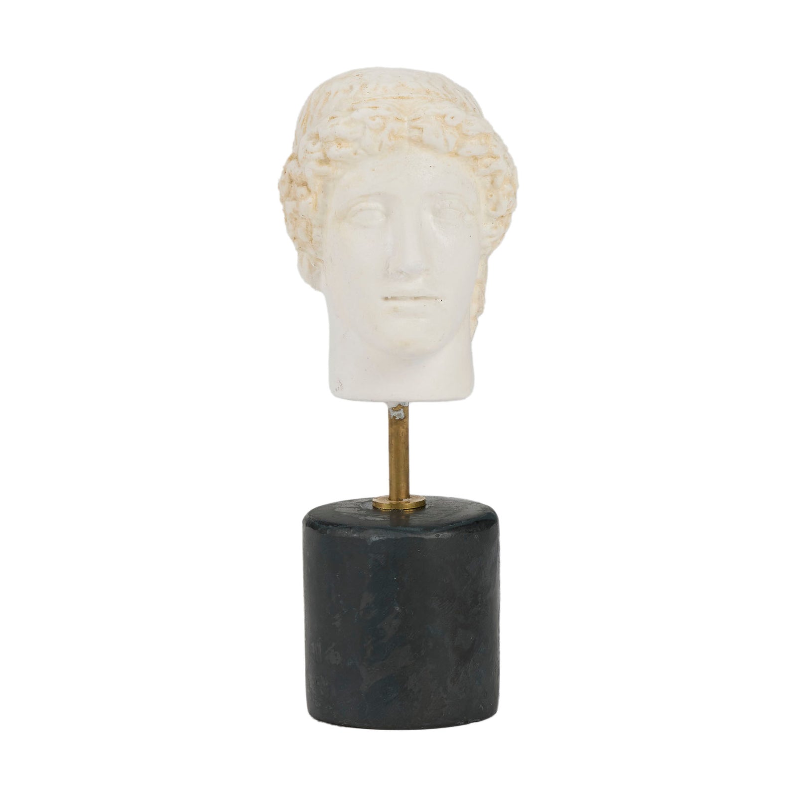 Marble bust on a black pedestal against a white background