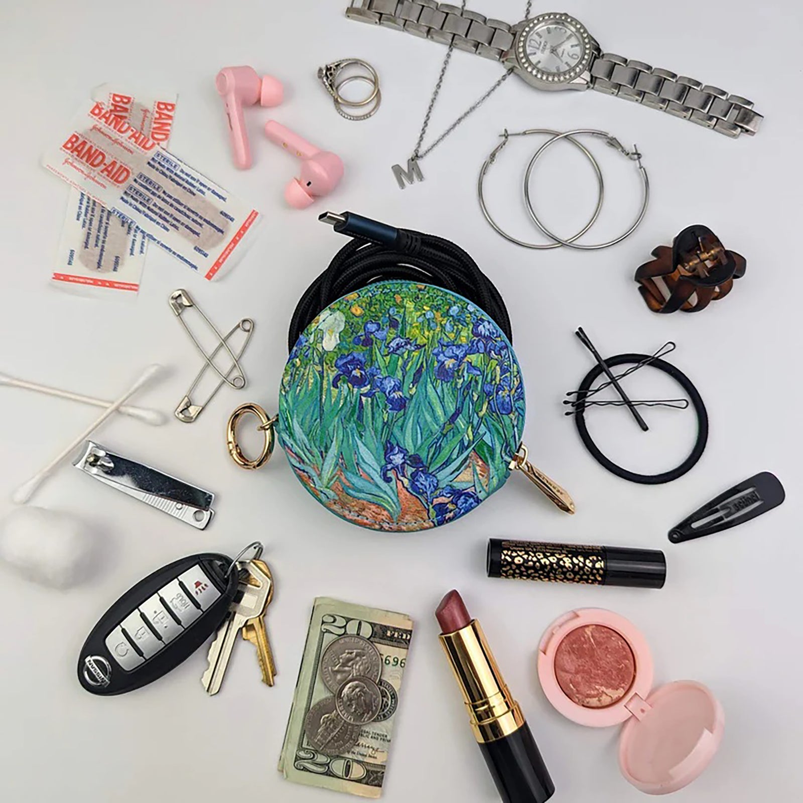 Round key case with Van Gogh 'Irises' design on a white background