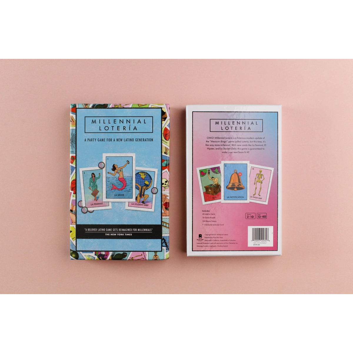 The front and back of the 'Millennial Loteria' party game box are displayed side-by-side on a solid dusty pink background.