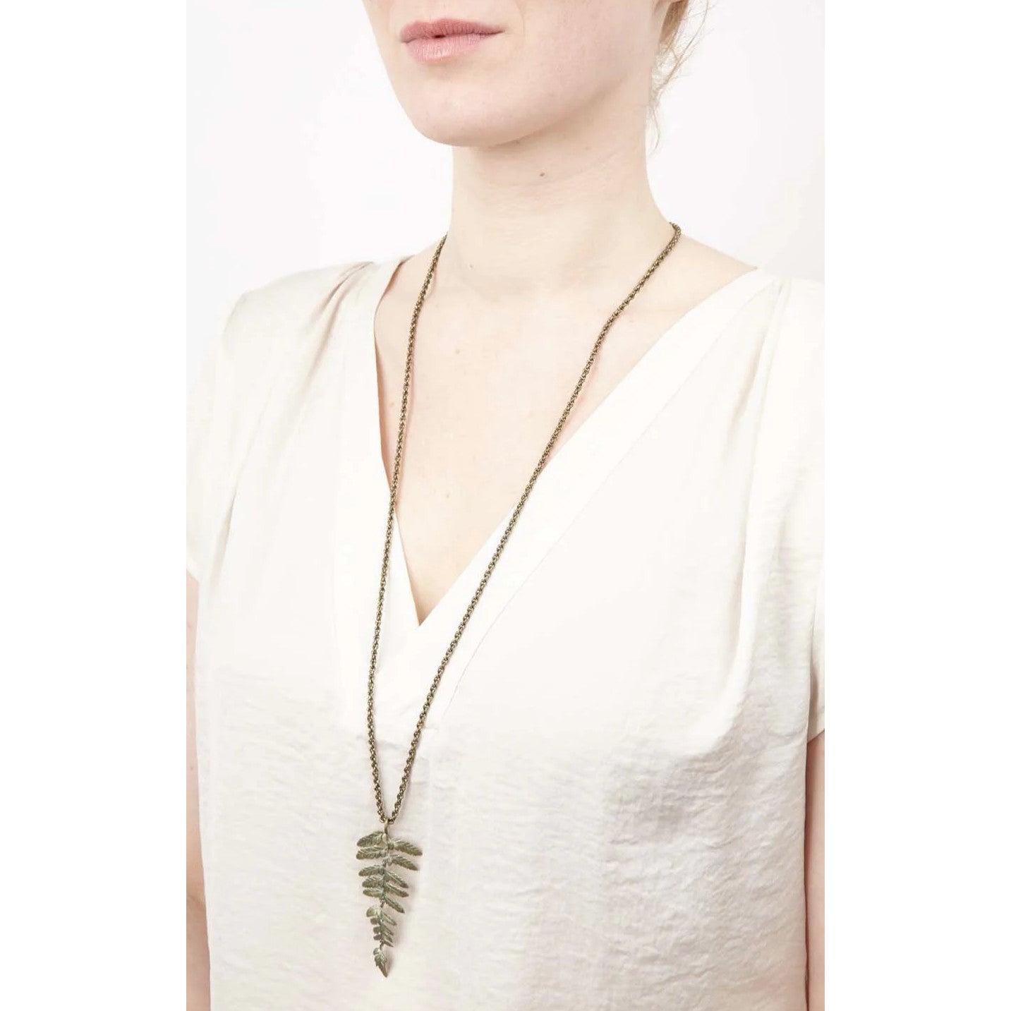Gold fern leaf necklace