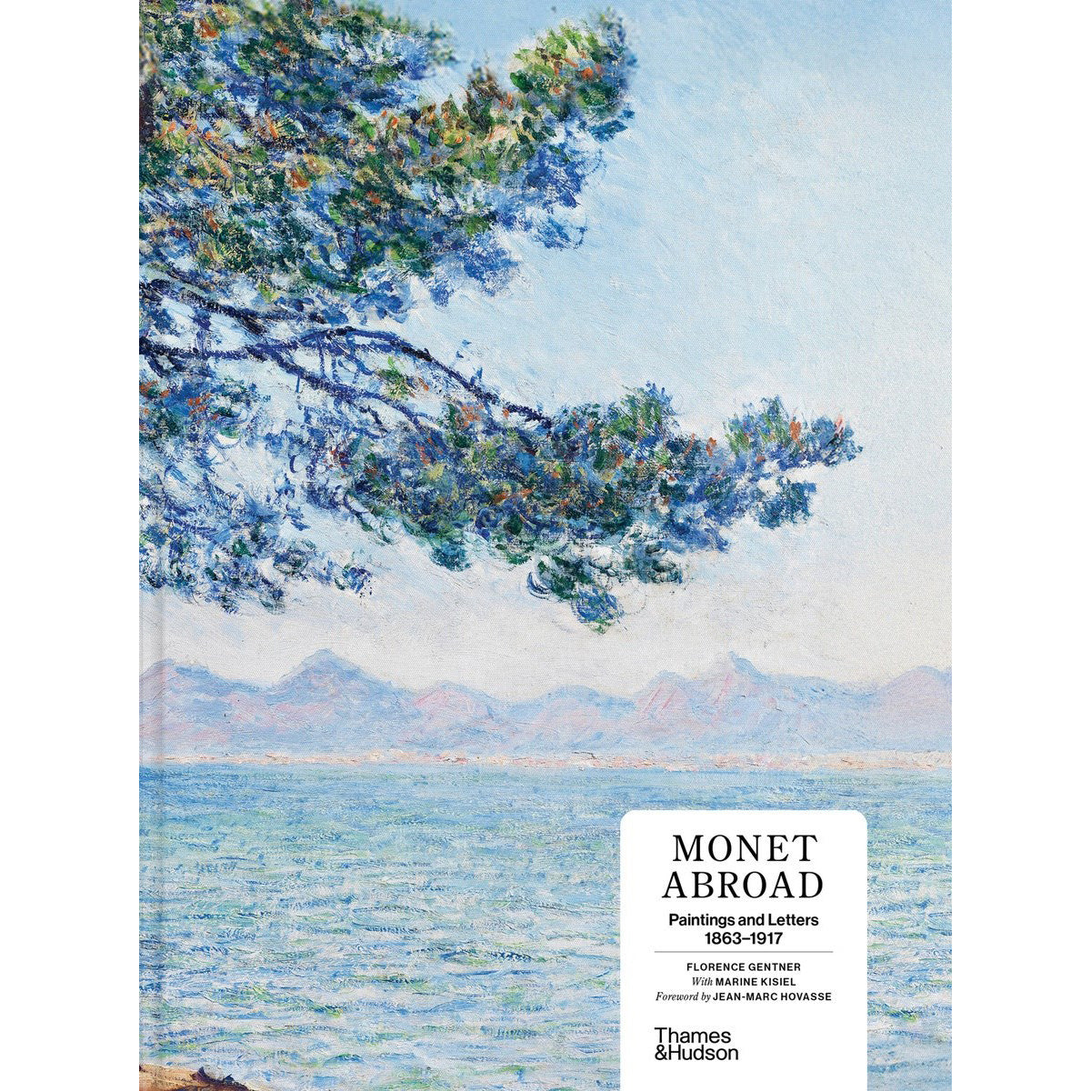 The front cover of the book 'Monet Abroad: Paintings and Letters 1903-1917' by Thames & Hudson. The cover features an impressionist painting of a coastal landscape with blue water, distant mountains, and a pine tree branch in the upper left, with a white title label in the lower right.