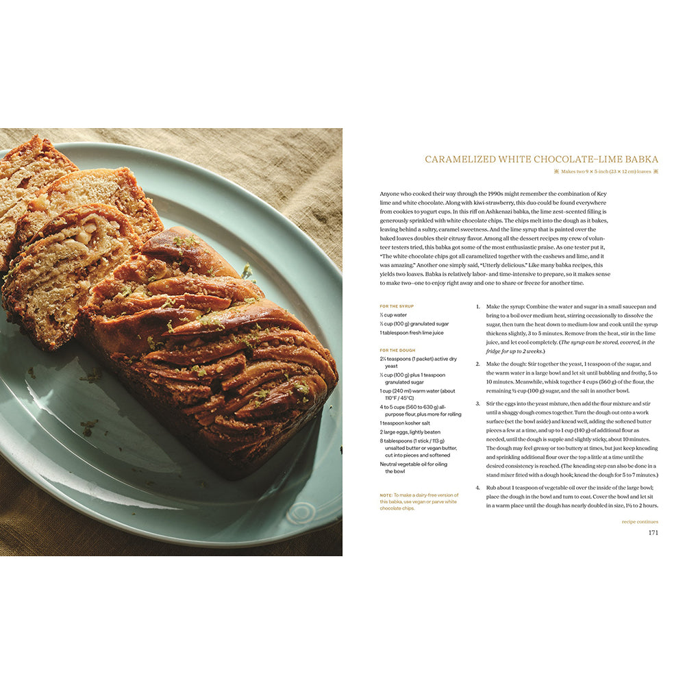 A printed recipe page showing a plated caramelized white chocolate lime bark dessert on the left and recipe text on the right, photographed against a light neutral background.
