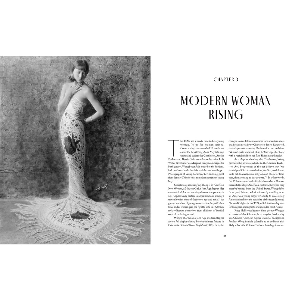 A printed book or magazine page spread with a black-and-white vintage photograph on the left showing a woman in a long, embellished gown, and the chapter title 'MODERN WOMAN RISING' with body text on the right.
