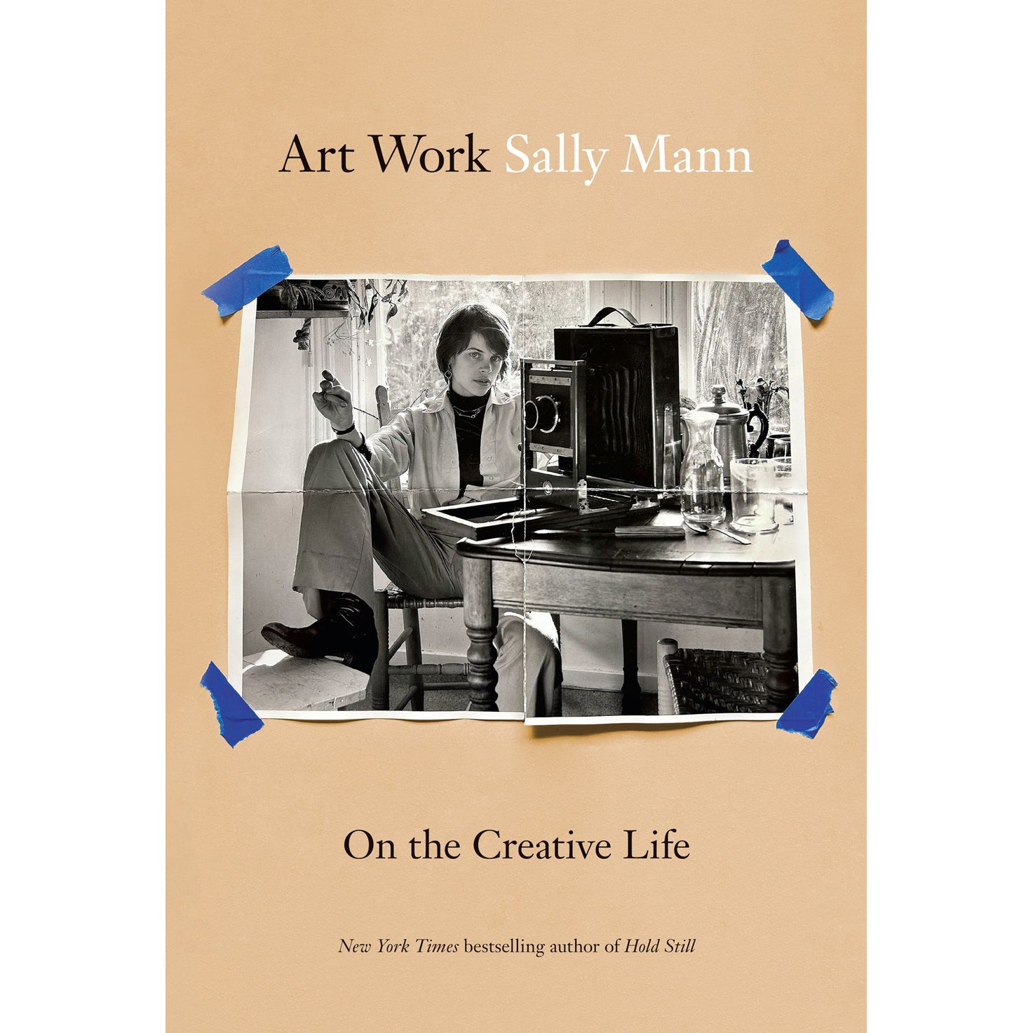 Book cover of 'Art Work Sally Mann: On the Creative Life' with a black and white photo of a woman with a camera.