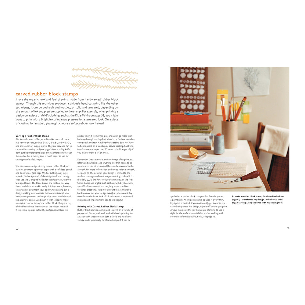 A two-page spread from a craft or stationery magazine featuring an article about carved rubber block stamps. The left page has text and decorative leaf illustrations, while the right page shows a styled workspace scene with a desk, notebook, cup, and a set of wooden stamps hanging on a wall.