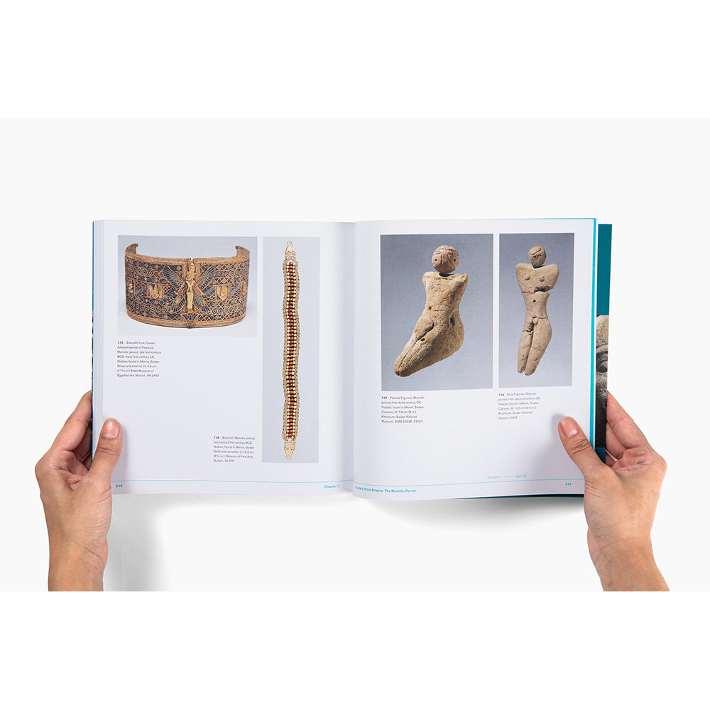 Open book showing images of ancient artifacts held by hands on a white background