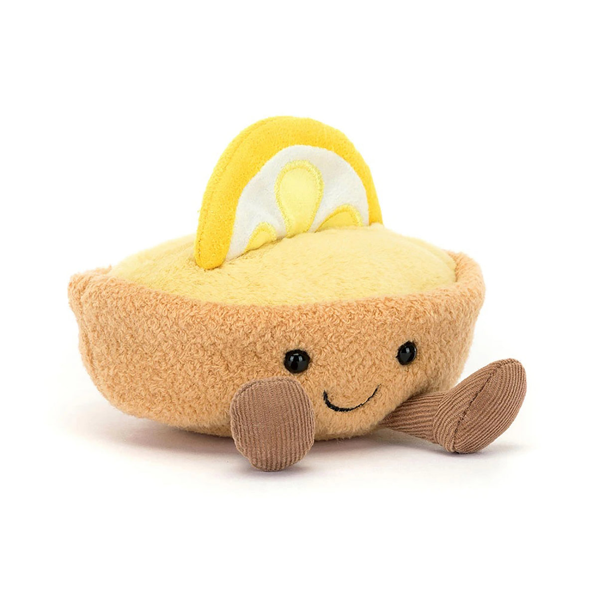 A plush lemon tart toy with a yellow textured body, a yellow and white lemon slice on top, brown corduroy legs, and a smiling face, photographed on a clean white background.