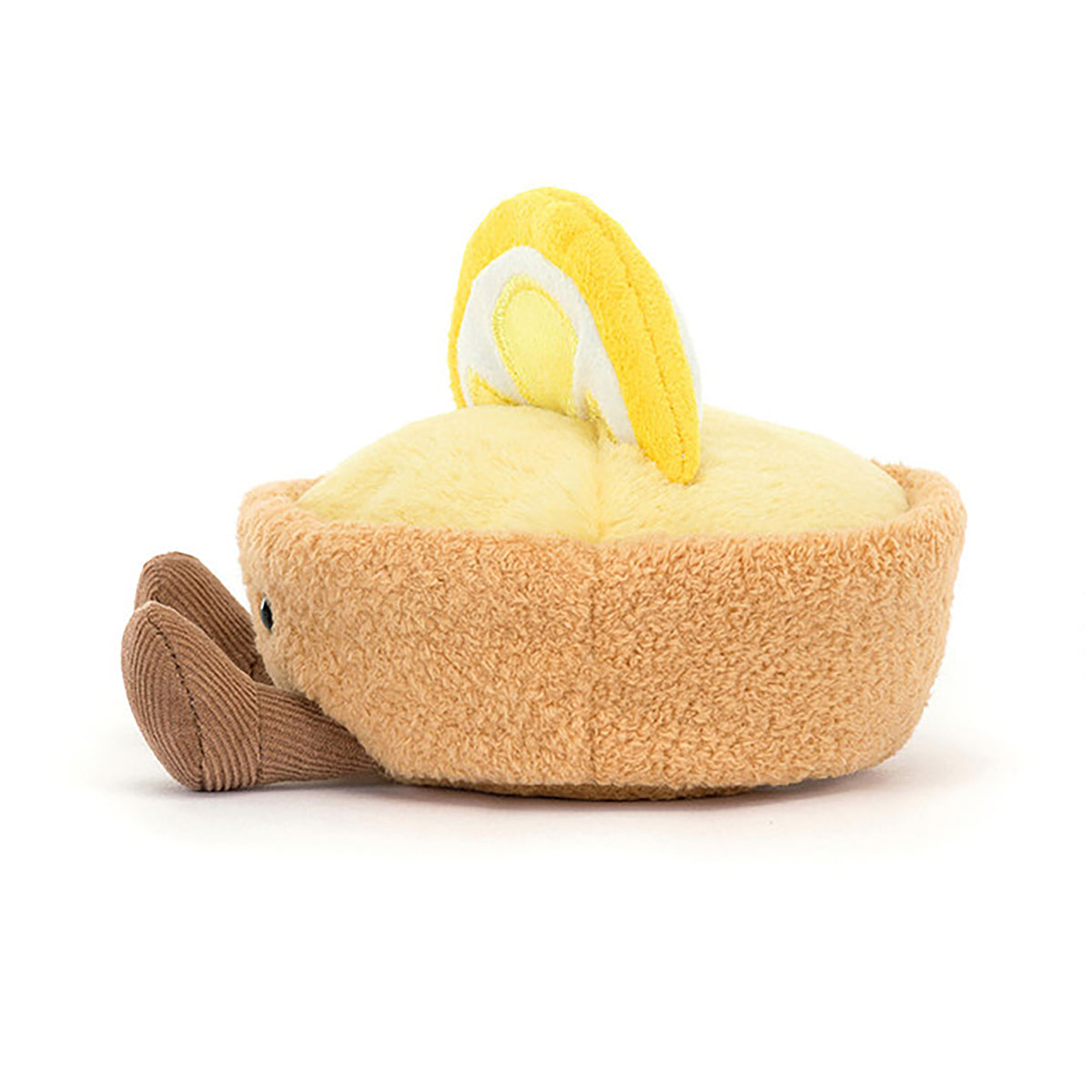 Plush toy resembling a lemon tarte on a white background
